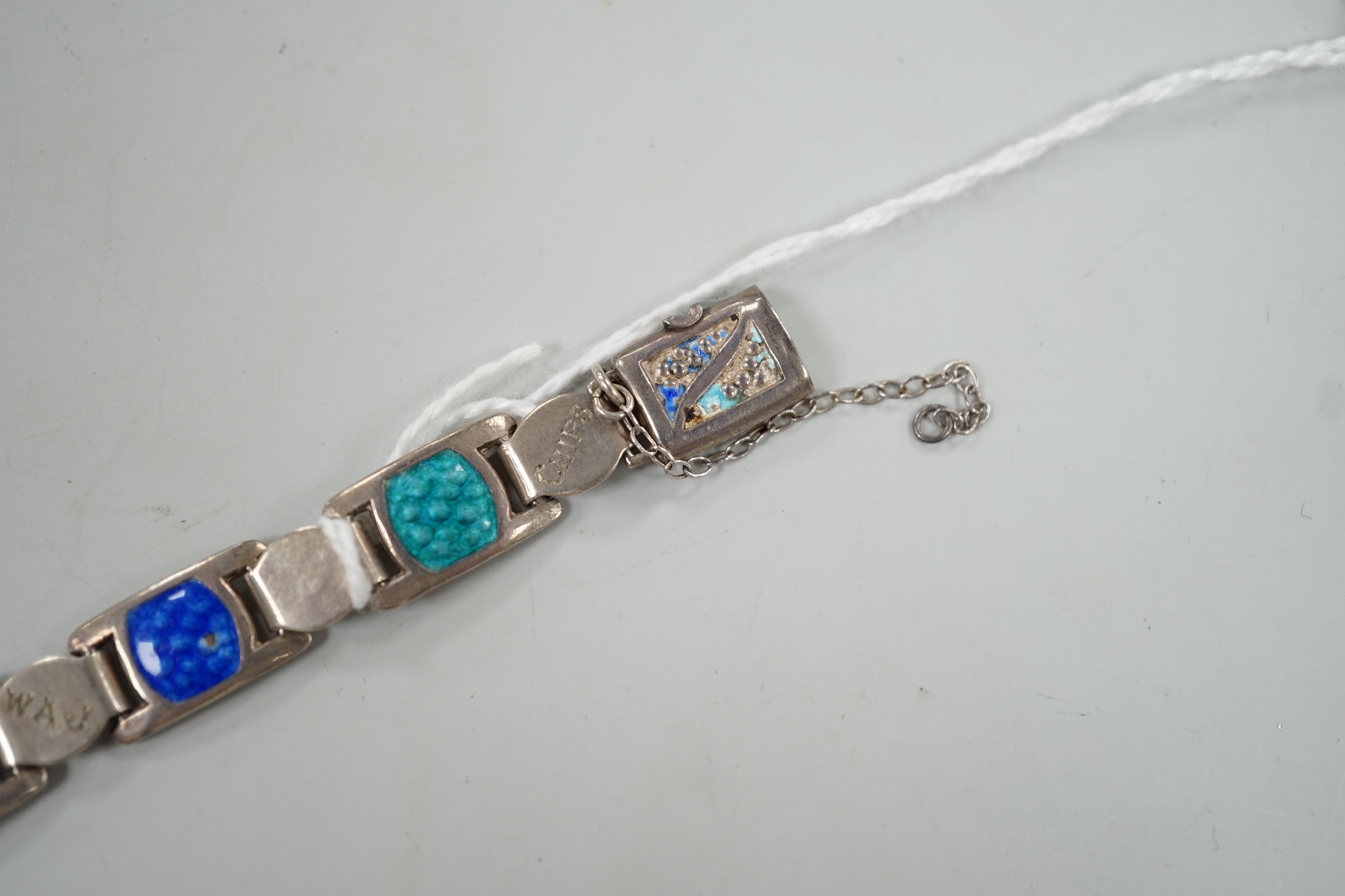 An Edwardian silver and two colour enamel bracelet, engraved with initials and words, 19cm.